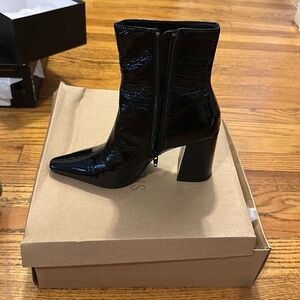 Black Steve Madden booties ,never worn